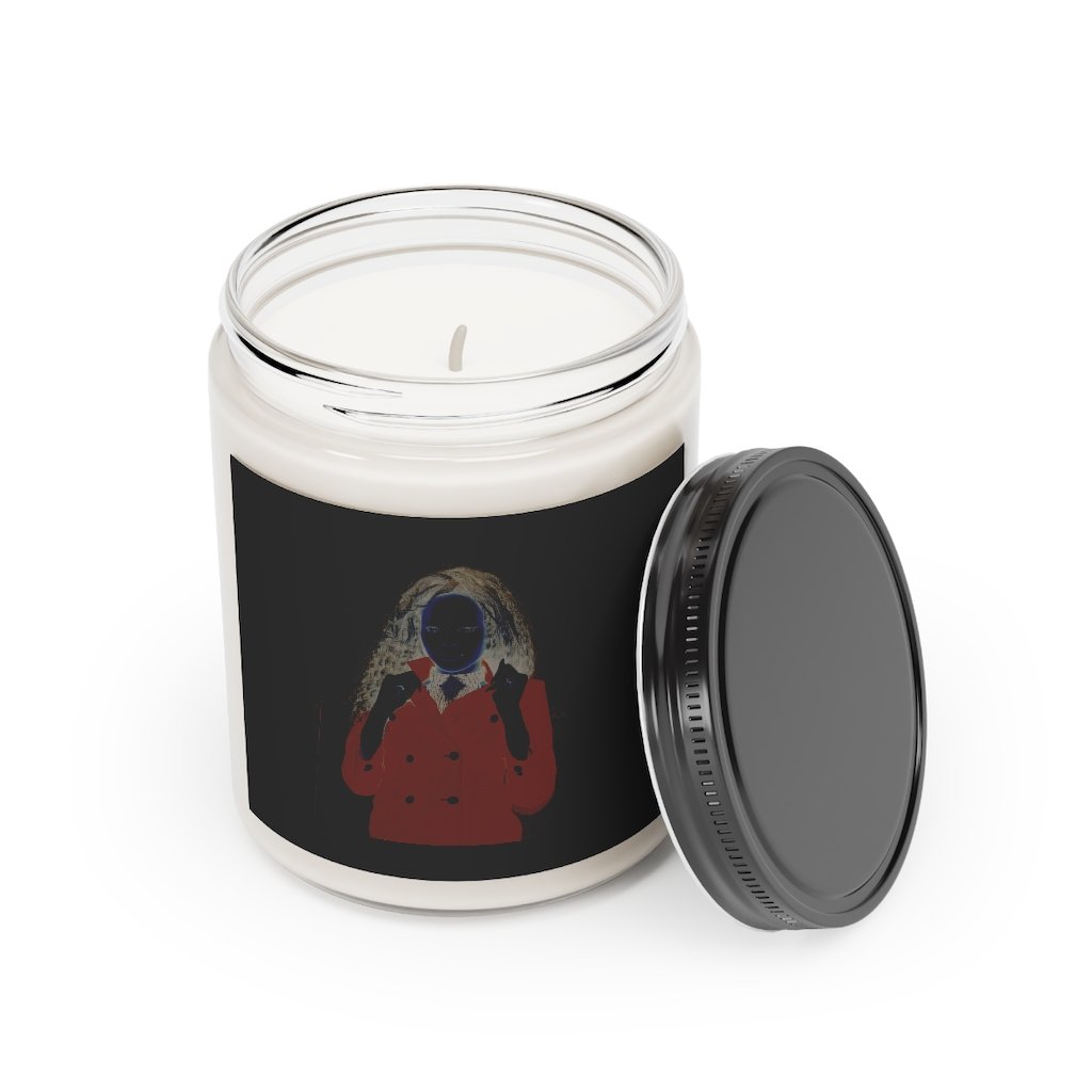 The Amani Scented Candle in a stylish glass container, featuring vegan soy coconut wax and available in Cinnamon Stick and Vanilla fragrances.